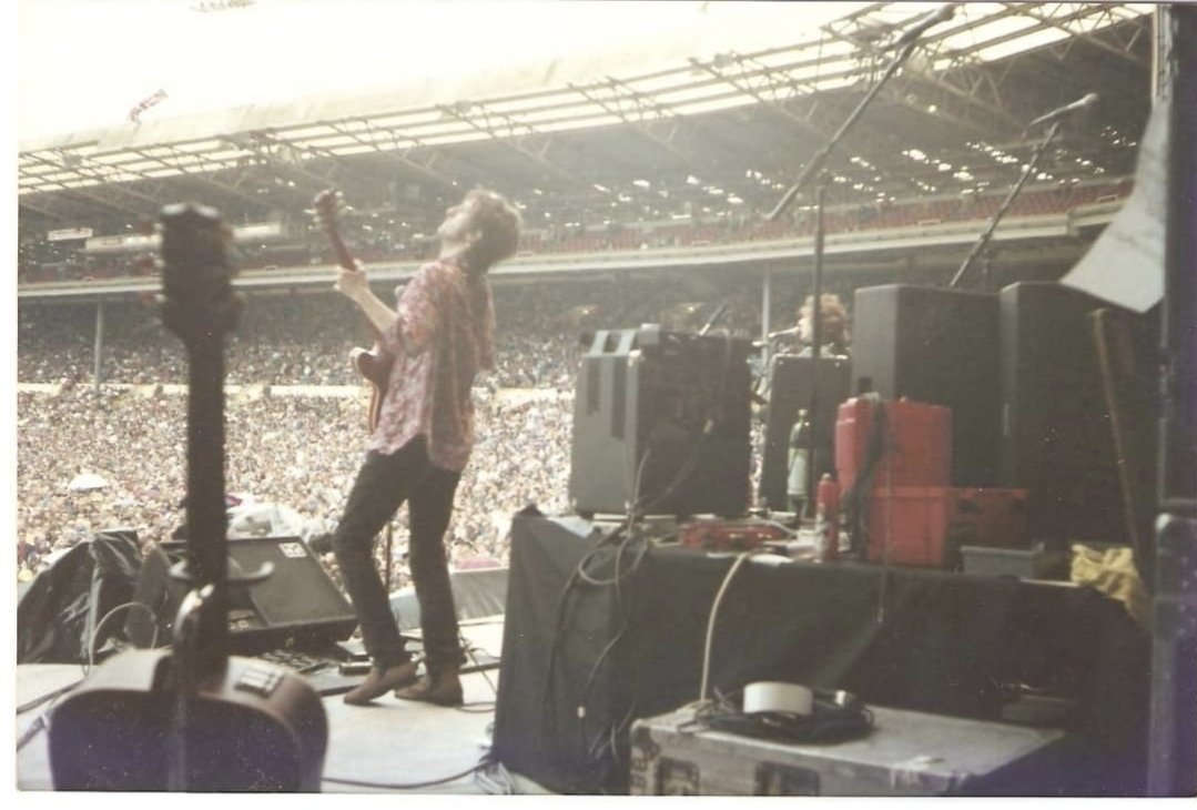 Here's Marco playing his guitar at Wembley Stadium. I love him.