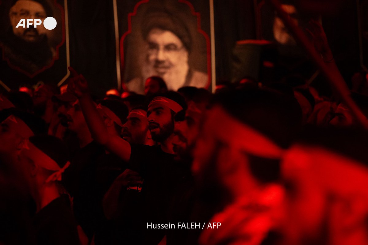 Hasan Zwaweh, a 30-year-old man who lost his eye-sight and part of his hand in the Israeli operation detonated hundreds of pagers and walkie-talkies used by Hezbollah, attends a mourning ritual in Iraq’s central holy shrine city of Karbala late on August 13
Hussein FALEH /<a href="/AFP/">AFP News Agency</a>