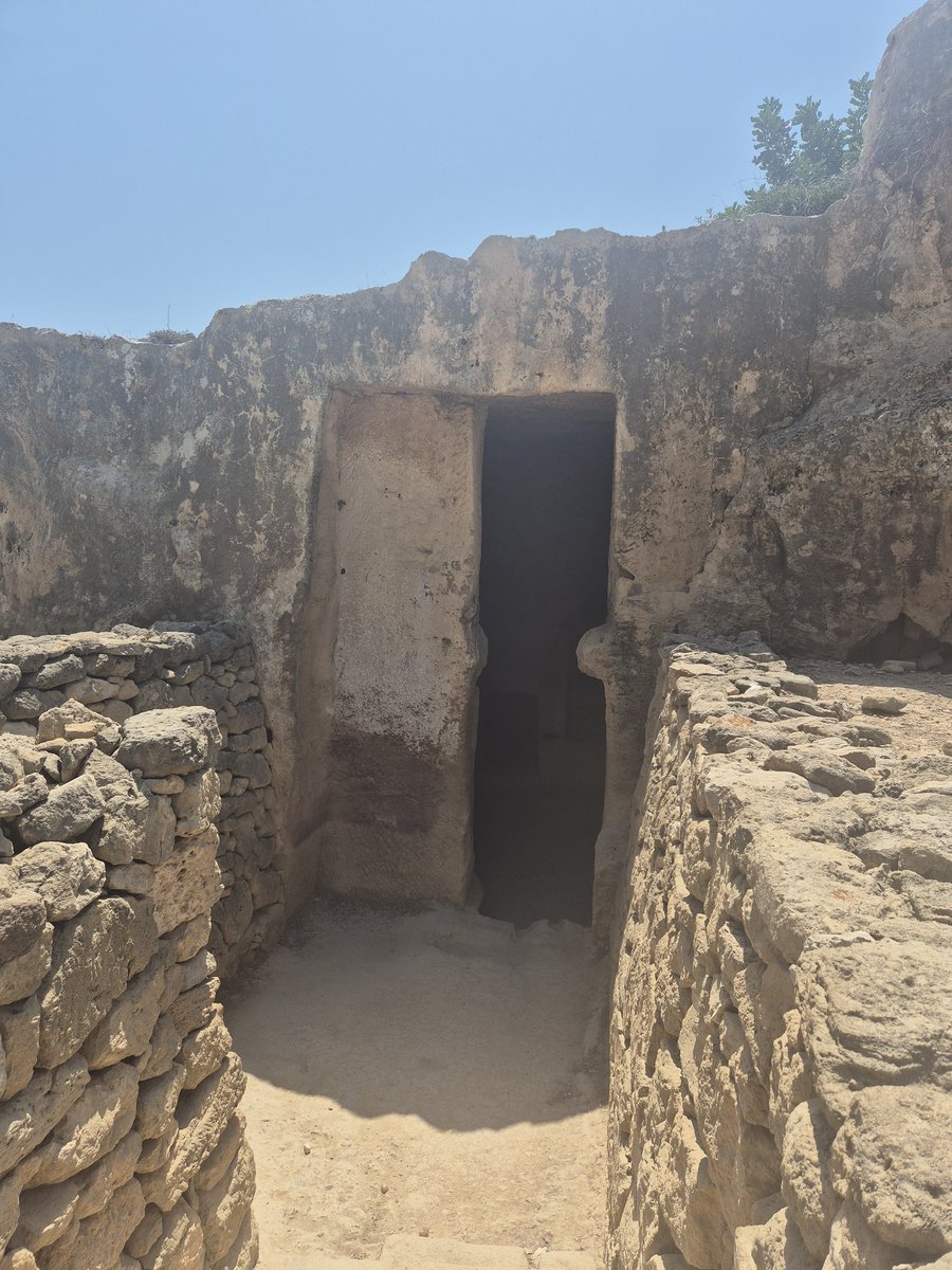 TheHistoryMouse's tweet photo. The design of this rock carved tomb doorway suggests greater complexity than first meets the eye. Recessed with one half cut through and corbels half way down. Sliding door? #DoorwayThursday #HeidiInPaphos #TheTombsOfTheKingsPaphos https://t.co/EnwOPwaOXN