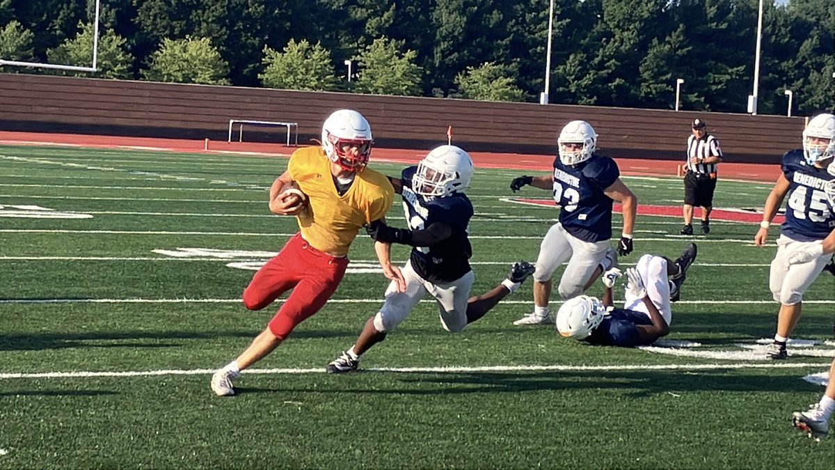 Nate Trefzger runs for a <a href="/Perry_Pirates/">Perry Pirates</a> first down tonight scrimmage against <a href="/BeneBengalsFB/">Benedictine Bengals Football</a>
