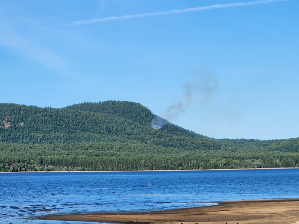 Small forest fire in Quebec as of 6:43pm EDT, just across the river from Deep River, Ontario (it has been reported). There was a solitary lightning strike around that area yesterday morning with the rain that came through