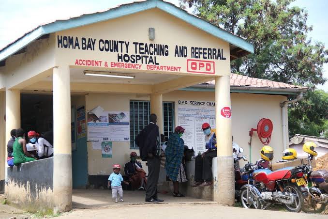 MwangiBonnie's tweet photo. I have told you before that devolution is not working as intended. 

Incase you have not been paying attention, take a look at the attached pictures. From @HomaBayCountyKE 

These first two pictures tell you all you need to know about priorities of those in government. Look at pictures 1 and 2. 

The average citizen there makes about KSH 11,000 per month. Before taxes. @gladyswanga makes a basic income that he 89 times what the average citizen makes. 

@HomaBayCountyKE spends about 44% of its revenue on politicians, their aides and friends. 

Home Bay has a population of 1.2 million. 

And yet, it spent KSH 4.4 billion- or 44% of its entire budget- on less than 2,500 employees. 

Please understand that. 44% of the doggone budget went to 0.2% of the population! 

That was in salaries alone. 

KSH 327 million in luxury travel. KSH 58 million in cars for MCAs. KSH 51 million for @gladyswanga and deputy for cars. In one freaking year!

Bursaries - for all kids in this purgatory. KSH 194 million. 

Support for local hospitals? KSH 131 million. 

Sit down for this one: 

For every shilling they spent to support local hospitals, they put aside 34 for their salaries!

Do you see the first picture? 

@gladyswanga and her other thieves in county government have the gall, the temerity, the unbridled chutzpah to say to citizens of Homa Bay: 

Delivering the promise! 

You cannot make up this nonsense. 

@KenyaGovernors
