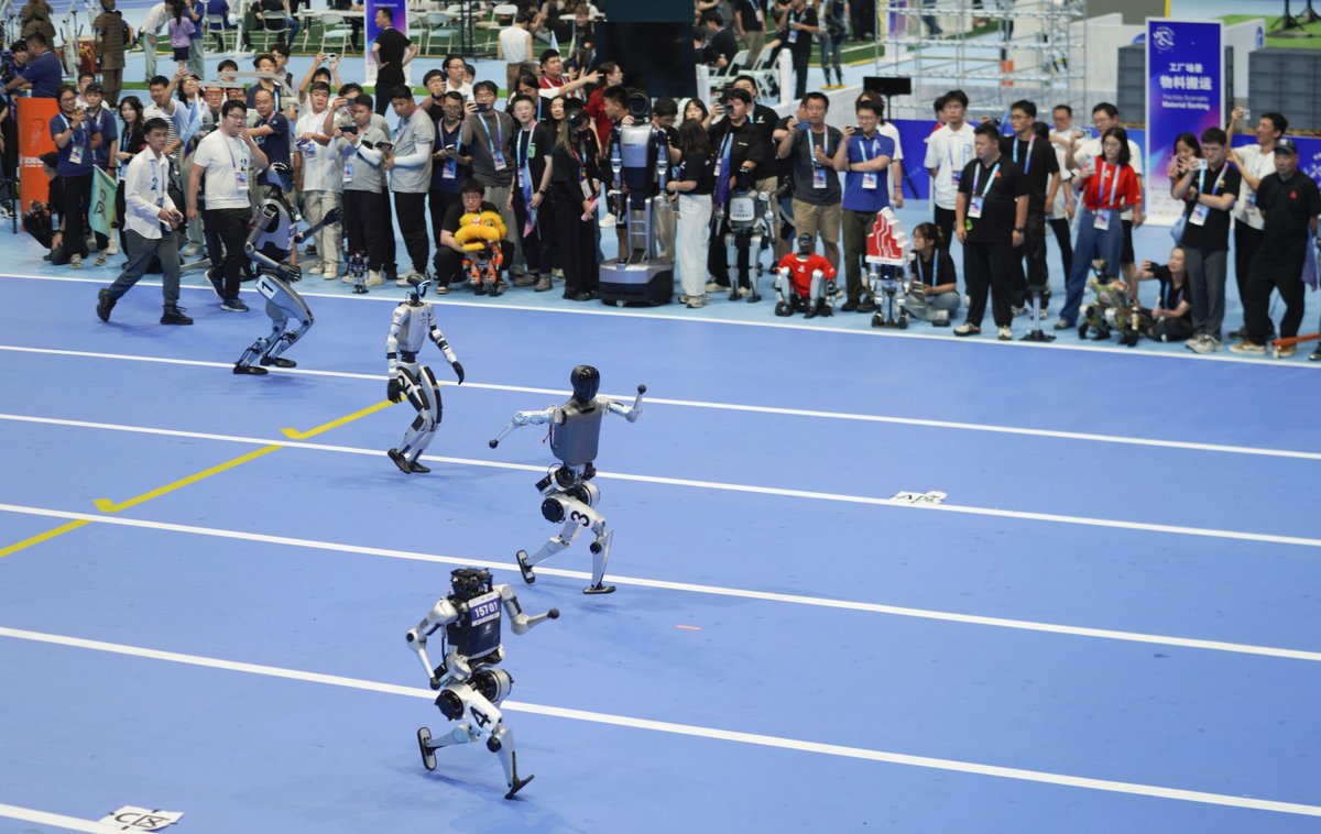 ChinaDaily's tweet photo. The world's first humanoid #robot games opened in Beijing on Thursday, offering a glimpse into what organizers describe as a "new era of human-machine symbiosis". #WHRG2025 https://t.co/bF4OsfCAA3 https://t.co/mcsq3yJ9lf