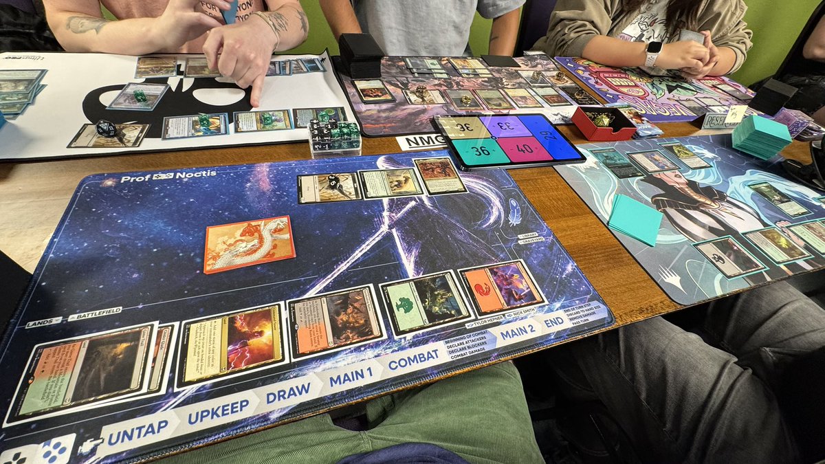 Breaking in the sick new playmat by <a href="/TylorHepnerArt/">Tylor Hepner</a> and <a href="/ProfNoctis/">ProfNoctis 🏝️ Summer Break 😎</a> with an insane 5-player deck swap.