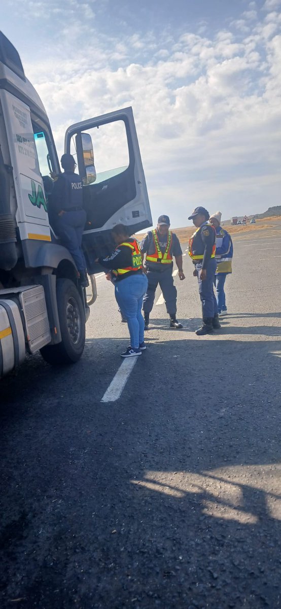 SAPoliceService's tweet photo. #sapsFS [WOMEN'S MONTH] As part of #OperationShanela II, members of #OperationBasadi took to the N1 earlier today where a high-visibility roadblock was conducted 10km outside Springfontein. The operation was led by Brigadier Street Sereetsi, District Commissioner of Xhariep, and Colonel Nyuliwe. The roadblock brought together Gariep District police stations and various provincial components, including POCC, #SAPS POP and #MountedUnit, HRM, Finance, Proactive Policing, VCIU, and Corporate Communication and Liaison.

The objective of the operation was to ensure the safety of road users while stamping the authority of the State by limiting the operational space for criminals. Women in blue conducted thorough inspections to ensure vehicles were roadworthy, and to detect criminal activities such as the presence of undocumented persons, illegal firearms, suspected stolen property, and drugs—thereby ensuring the safety and security of all South Africans.

Pamphlets on Gender-Based Violence (#GBV), #FightAgainstExtortion and related crimes were distributed to motorists as part of the awareness drive. The operation yielded notable results, including the issuing of various fines, the arrest of two suspects for illegal possession of a firearm and ammo, and the arrest of one undocumented person. #WomensMonth #PoliceVisibility #RoadSafety ME