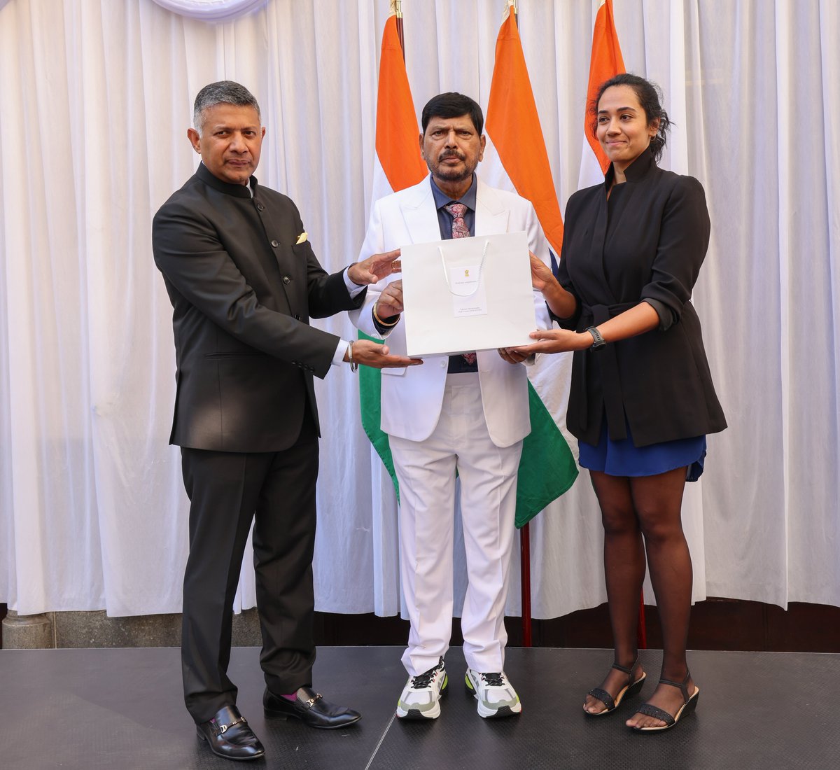 HCI_London's tweet photo. MoS Dr @RamdasAthawale and HC @VDoraiswami felicitated special guests at the occasion – Mrs. Sukhjinder Kaur Lochab, granddaughter of Shaheed Kartar Singh Sarabha, the Ghadr party revolutionary who gave his life for the country, Ms. Ananya Prasad, the first woman of colour to row solo and unsupported across the Atlantic Ocean, and Mr. Yogesh Alekari who has ridden an Indian made motorbike across Europe and Africa covering 60,000 km and 50+ Countries in 220 days.