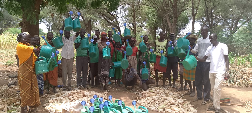 NNorthrift's tweet photo. In Morulem, Turkana County, 40 lead farmers received 40 watering cans from the #TurkanaEastResilience Project by @mccpeace &amp; @KenyaNCCK to grow tree nurseries,  boosting conservation, climate resilience &amp; livelihoods.💧 #ClimateAction #TreePlanting https://t.co/zT2G1RG39G