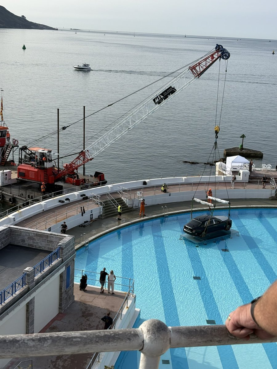 declan_stamp's tweet photo. @oasis @liamgallagher @NoelGallagher 

Is this the confirmation for a new album or a promotion for something big next year? 
Who else puts a Rolls Royce in a swimming pool in Plymouth https://t.co/k2mmJTN48J