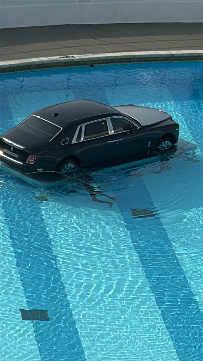 declan_stamp's tweet photo. @oasis @liamgallagher @NoelGallagher 

Is this the confirmation for a new album or a promotion for something big next year? 
Who else puts a Rolls Royce in a swimming pool in Plymouth https://t.co/k2mmJTN48J