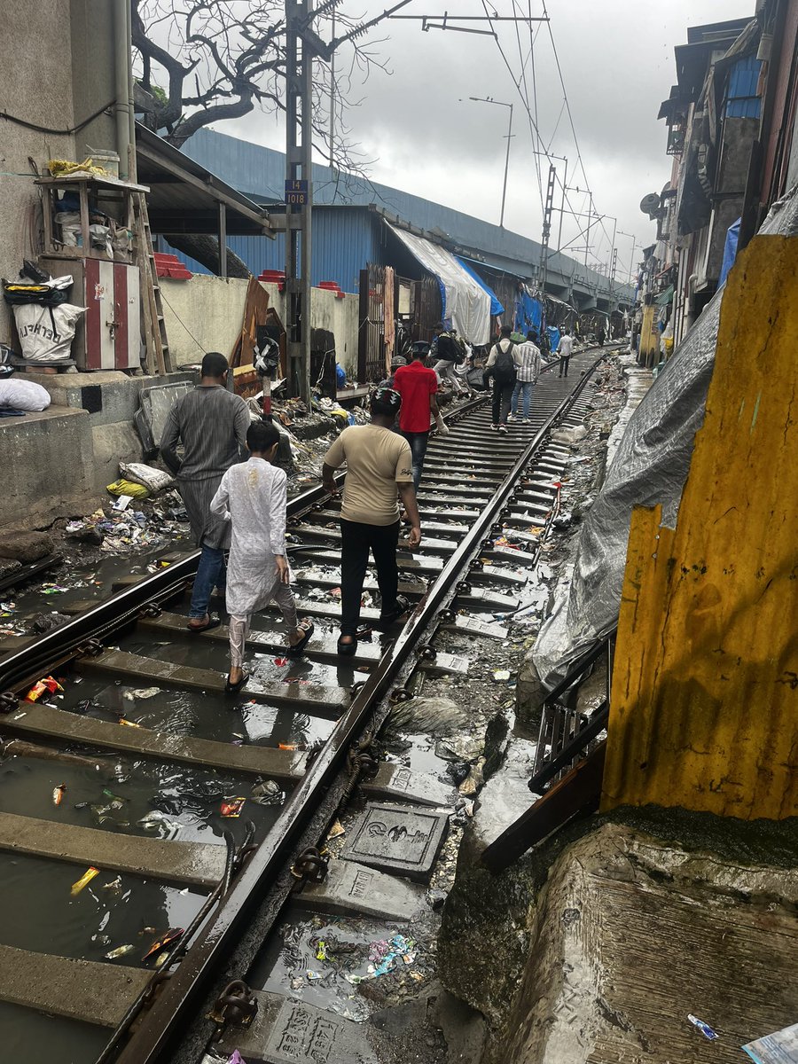 Drastic condition of service track at Bandra Terminus which connects between platform number 4 and 5 <a href="/drmbct/">DRM - Mumbai Central, WR</a> <a href="/RailMinIndia/">Ministry of Railways</a> <a href="/WesternRly/">Western Railway</a> <a href="/Central_Railway/">Central Railway</a> people are struggling to take exit <a href="/RPFCR/">Central Railway RPF</a>