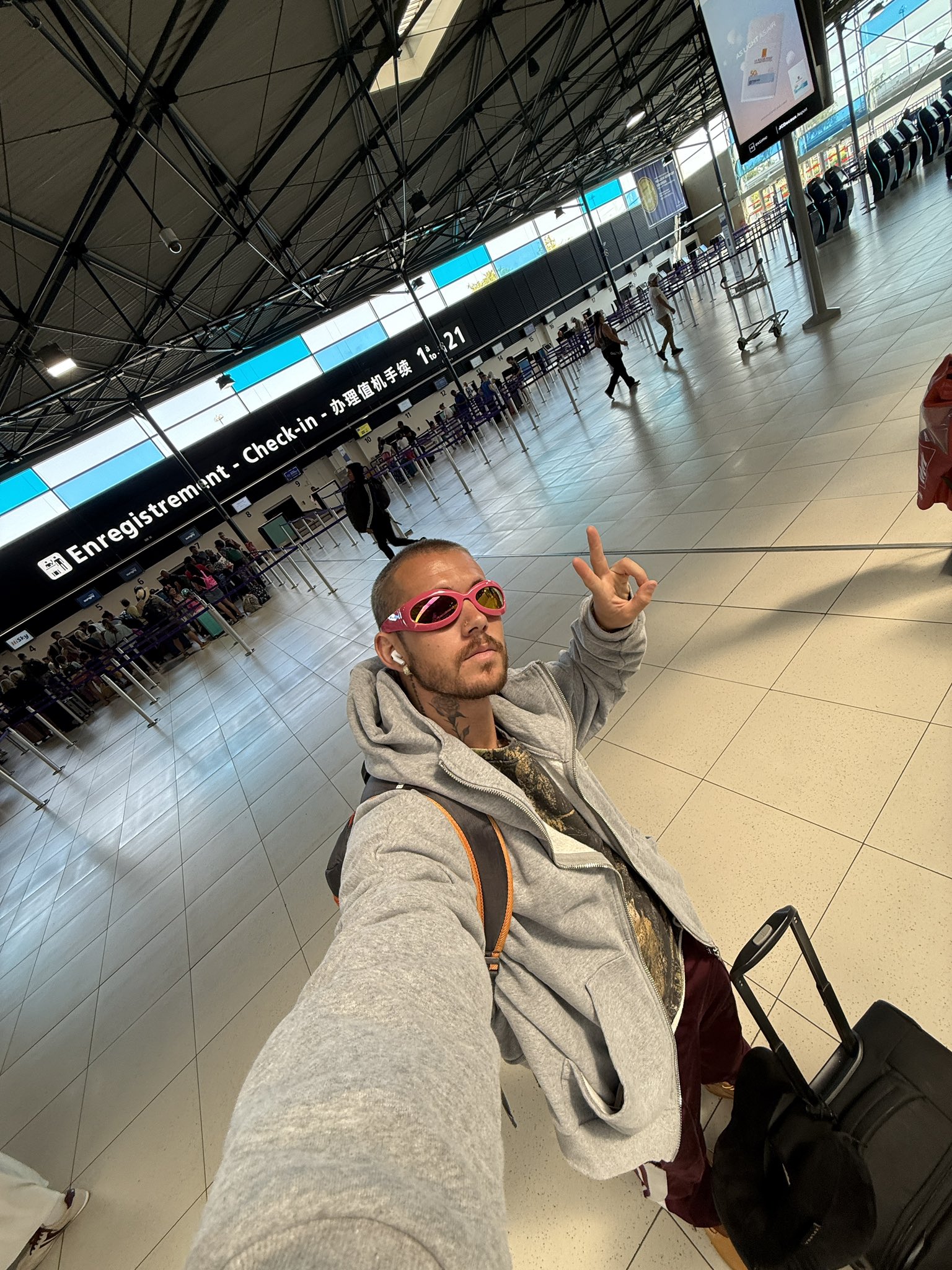 An aerial view of waves crashing against a shore.