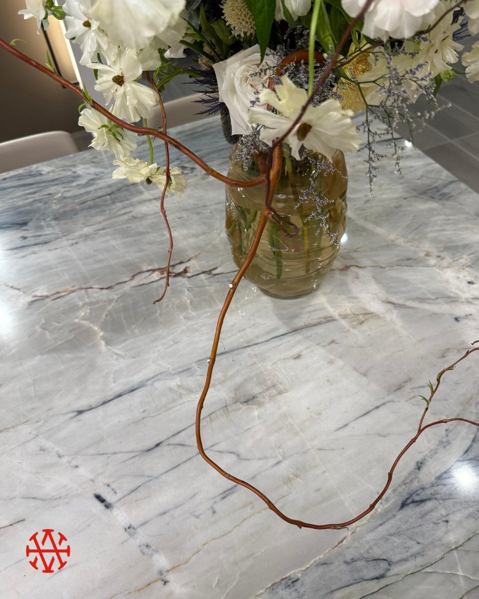 We have another stone at @Rothliving new showroom, Ijen Blue! Our Ijen Blue Quartzite goes beautifully in this well lit kitchen! And look at the bookmatched island! 

#Quartzite #amsumandash #winc #naturalstone #intallation #wincevents #womeninconstruction #designinspire