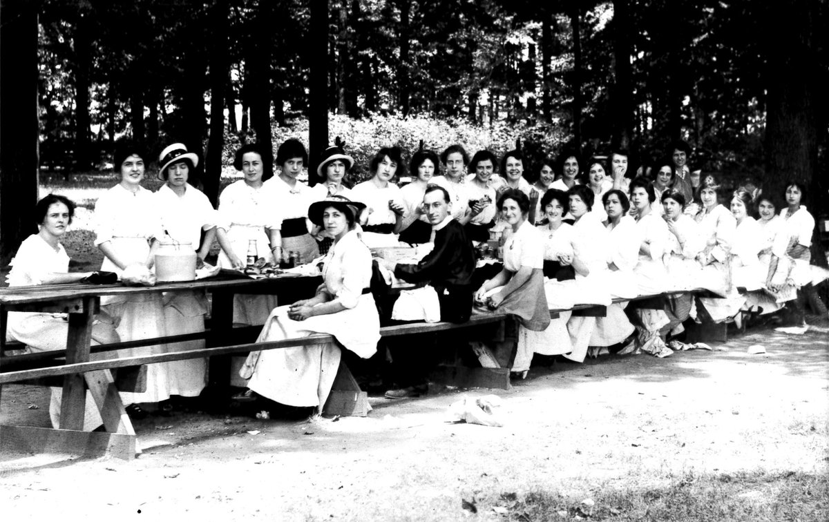 Today is the Solemnity of the #Assumption. Why not celebrate with these ladies at the 1923 Ladies' Sodality Picnic at the former Assumption Parish in Indy? The priest in the photo is Fr. Raphael Huber, a Conventual Franciscan who assisted at the parish, which closed in 1995.