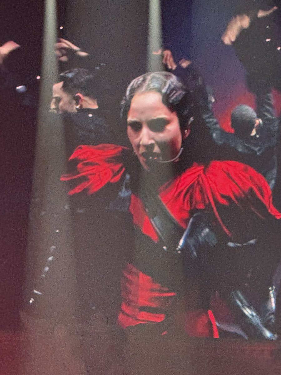 Lady Gaga is rocking a new wig and a black sash for the first