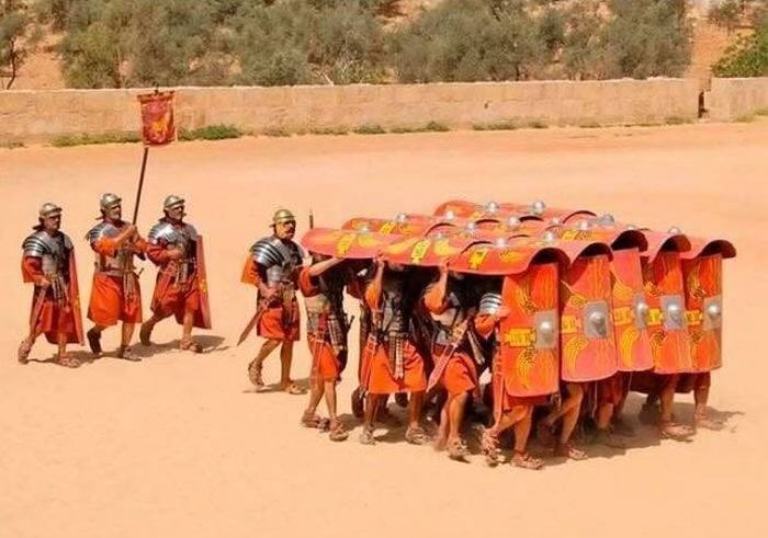 Roman soldiers in testudo formation symbolizing the battle for data sovereignty