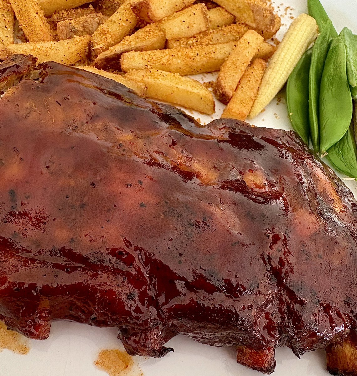 Pork ribs in a molasses glaze with <a href="/AngusandOink/">Angus & Oink</a> seasoned fries and some old veg from the fridge