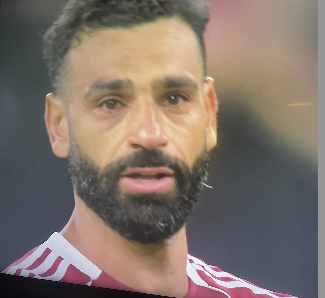 Footballtweet's tweet photo. Mo Salah in tears at the end of the match as the fans cheer Diogo Jota's chant. 😢💔

Such an emotional opening day for Liverpool at Anfield. https://t.co/keB986ztQ5
