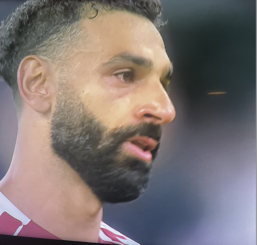 Footballtweet's tweet photo. Mo Salah in tears at the end of the match as the fans cheer Diogo Jota's chant. 😢💔

Such an emotional opening day for Liverpool at Anfield. https://t.co/keB986ztQ5