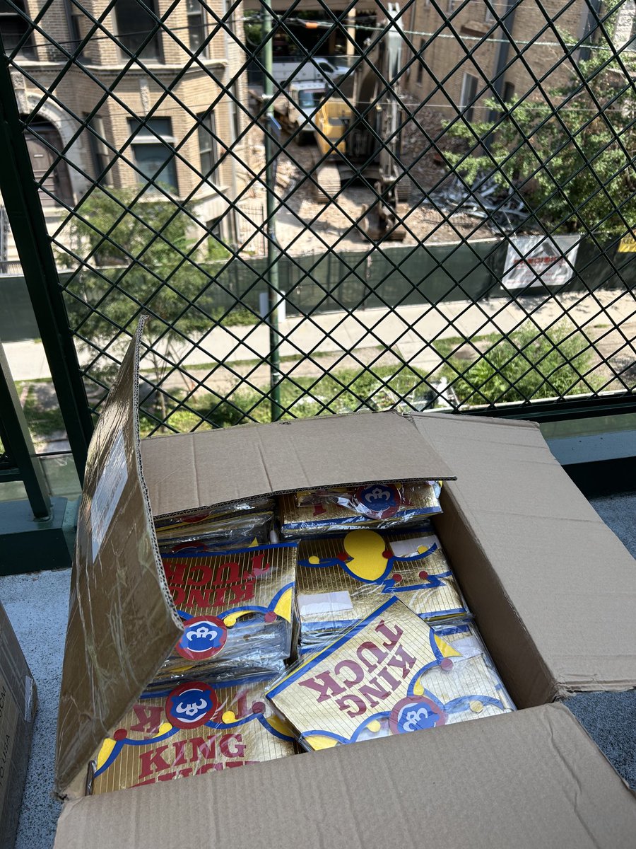 Not many takers today for these free cardboard King Tuck crowns.