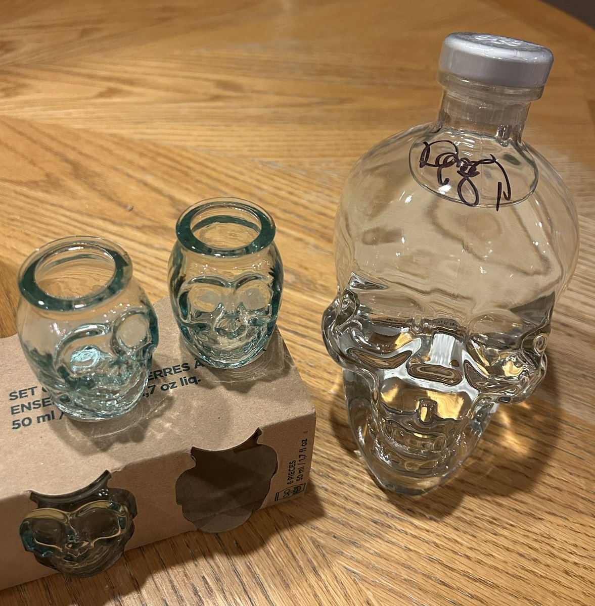 dp90amato's tweet photo. @dan_aykroyd got some new shot glasses. There really is only one choice to accompany them. And it’s signed to boot! BONUS! https://t.co/HccUvAsVPp