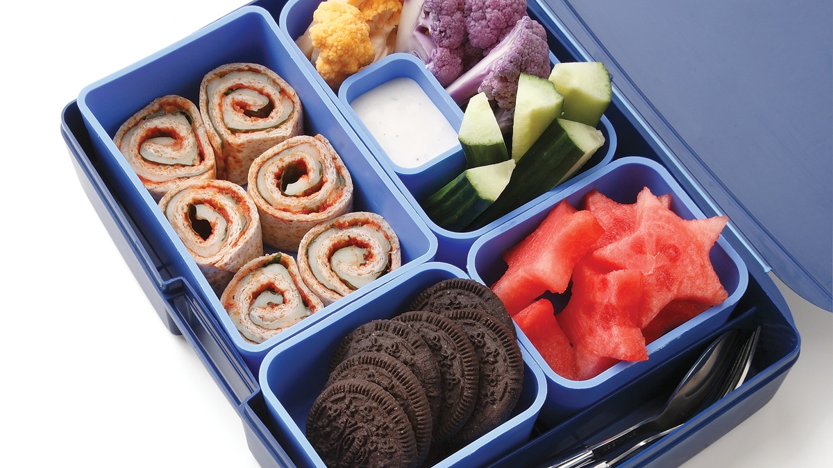 Fuel busy back-to-school days with quick, delicious lunches! 🍎 Get free recipes like this #pizza roll-up bento box #lunch along with more #meal and #snack ideas for your #kids when you sign up for Everyday Well Eats™: bit.ly/40k1vyO.