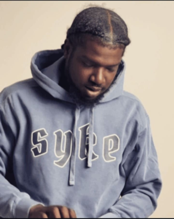 SYKEbrand's tweet image. Big shoutout to @iamandrez for owning the Blue Rose Premium SYKE Hoodie! Share your SYKE fit for a chance to be featured. #SYKECommunity 
🛒 Tag us and shop at sykebrand.com.

#SYKEFans #CommunityStyle #StreetwearVibes #CustomerSpotlight #SYKEFit #BoldCommunity