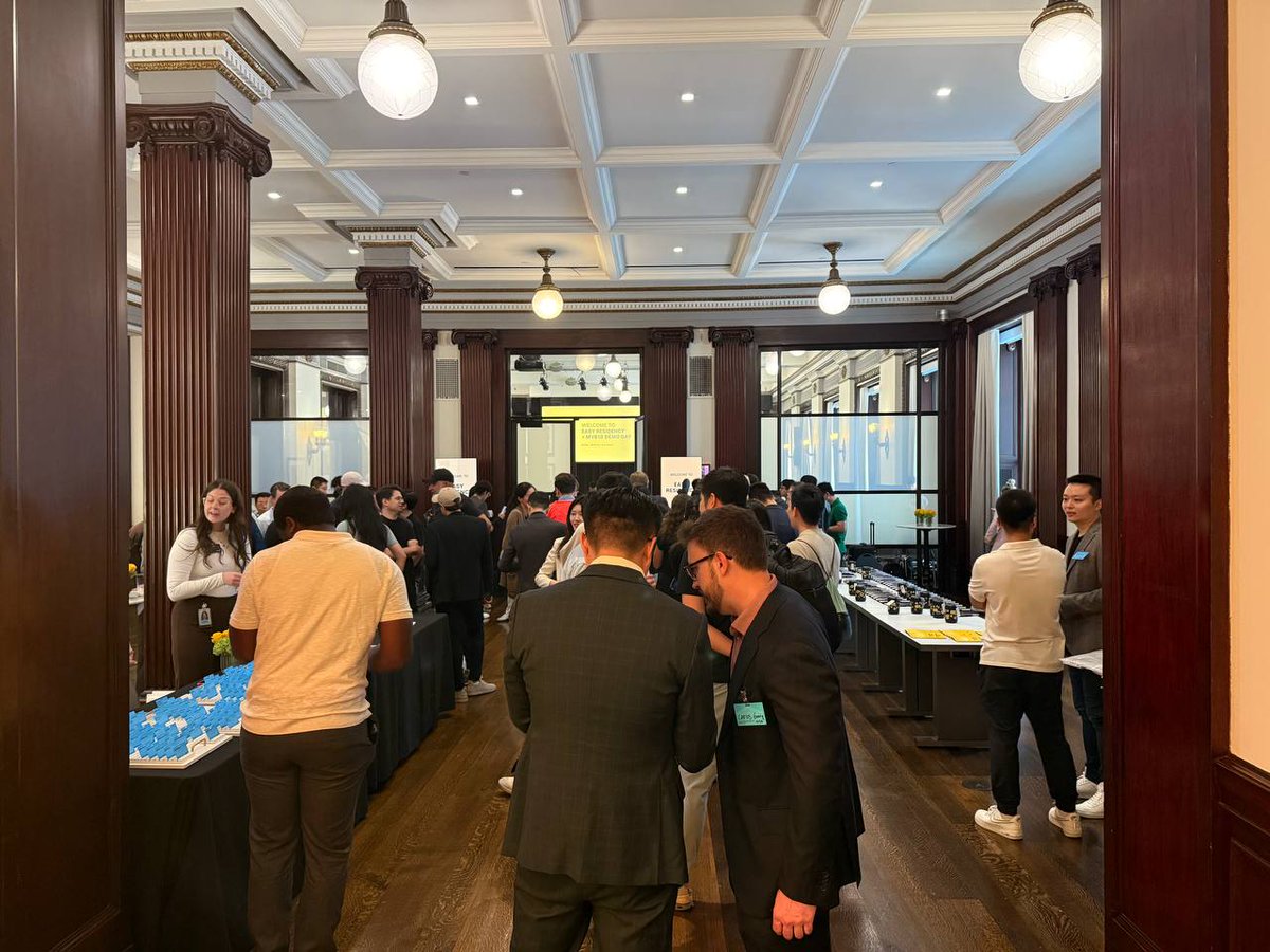 Stage view at MVB10 Demo Day with YZ Labs and BNB Chain branding on screen