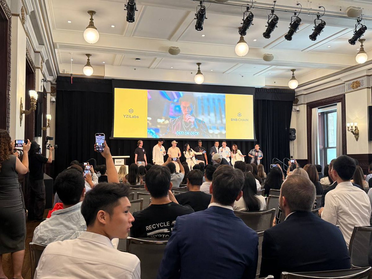 Audience capturing the MVB10 Demo Day panel at NYSE featuring ShareX Network and partners