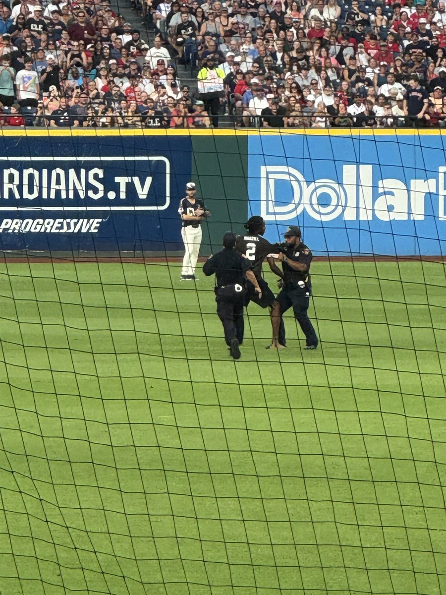 Chris_Renkel's tweet photo. You don’t see that every day. 

Guardians fan wearing a Manziel jersey just jumped onto the field and refused to leave. https://t.co/6R8tAtZSQU
