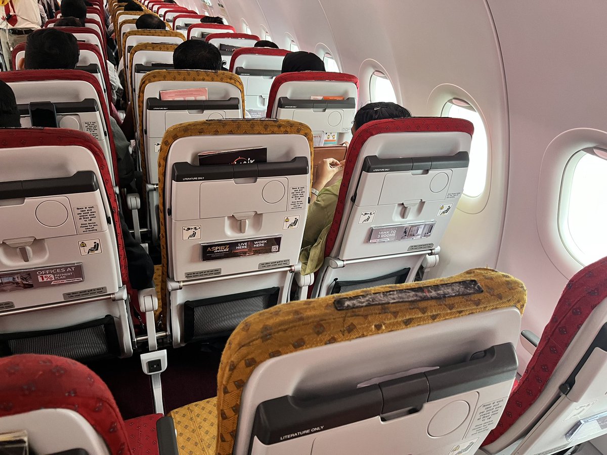nitin16694's tweet photo. @AirIndiaX @AirIndiaX @airindia I asked for window seat they said it’s chargeable and it’s a heavy loaded flight. PFA the photos of heavy loaded flight. Thanks for spoiling our first trip after marriage. https://t.co/PibHF2exvO