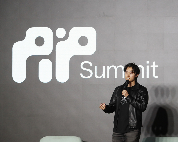 Jason Zhao speaking at IP Summit