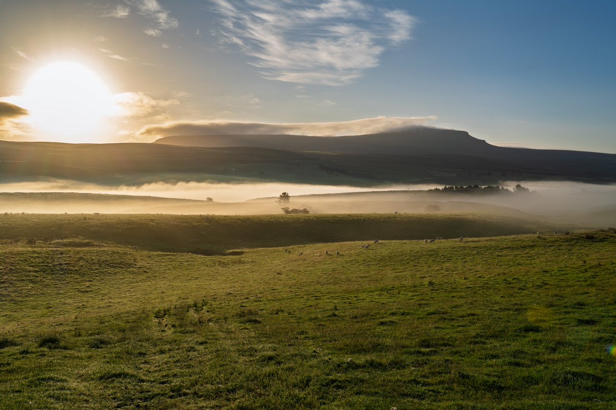 Sunrise over Penyghent just before commencing The Three Peaks Challenge.