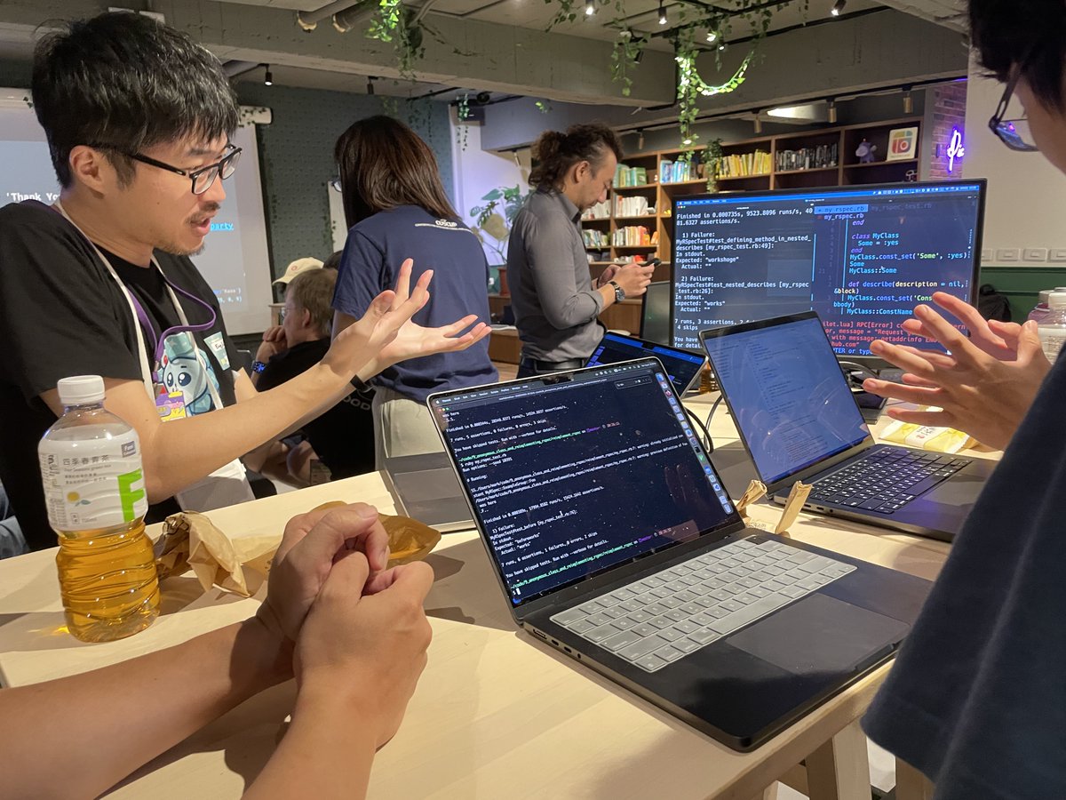 rubyconftw's tweet image. The “Metaprogramming with Ruby” table hosted by @okuramasafumi tried building a simplified RSpec clone.
Everyone frowned together at the metaprogramming code. 🤨 Matz wandered by with a 車輪餅 and joined in.
2025-08-09 #CodeParty #RubyConfTW #COSCUP