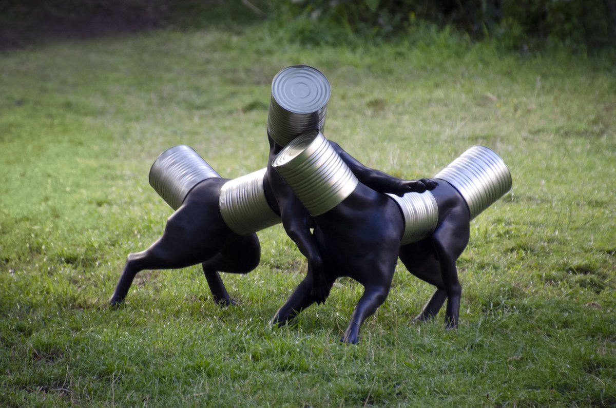 "Quality and Quantity" by Manuel Tozzi (<a href="/tozzi_manuel/">Manuel Tozzi</a>).

Manuel Tozzi
Quality &amp; Quantity, 2025
Polylactide, black structure lacquer, aluminium cans
100 x 80 x 75cm

"Quality and Quality" are two creatures whose limbs descend from dogs, but their heads, torsos, and rear ends are