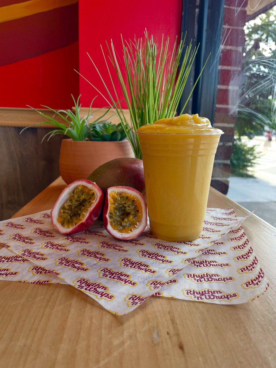 ☀️🍹 Our Passionfruit Mango Smoothie is fresh, tropical, and made to order right here at Rhythm ‘n Wraps. Summer in every sip! 🌴🥭 

Rhythmnwraps.com