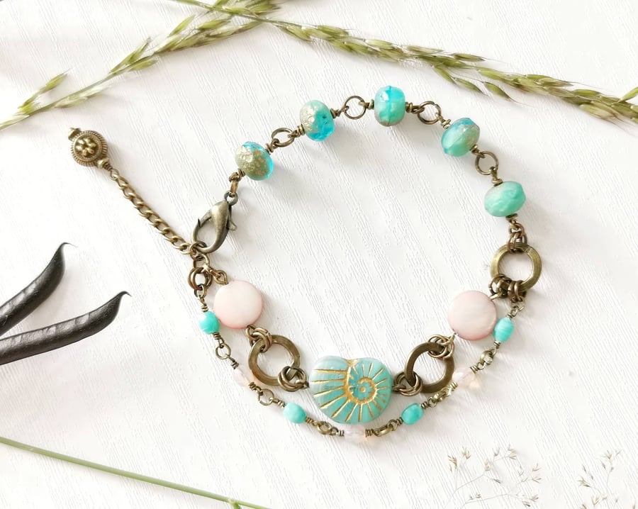 Add softness to your summer look with our chic Turquoise Boho Shell Bracelet.

folksy.com/items/8146837-…

#summer #style #handmade #CraftBizParty #shopindie