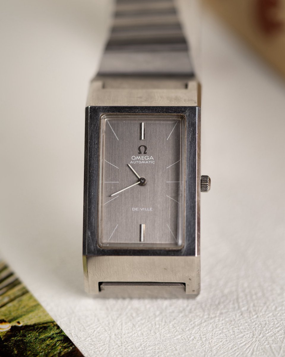Nicknamed the “Deauville,” this Omega De Ville is defined by its bold rectangular compressor case. Powered by an automatic movement and paired with an almost Brutalist inspired Omega bracelet, it’s a sharp slice of 1970s design. Available now.