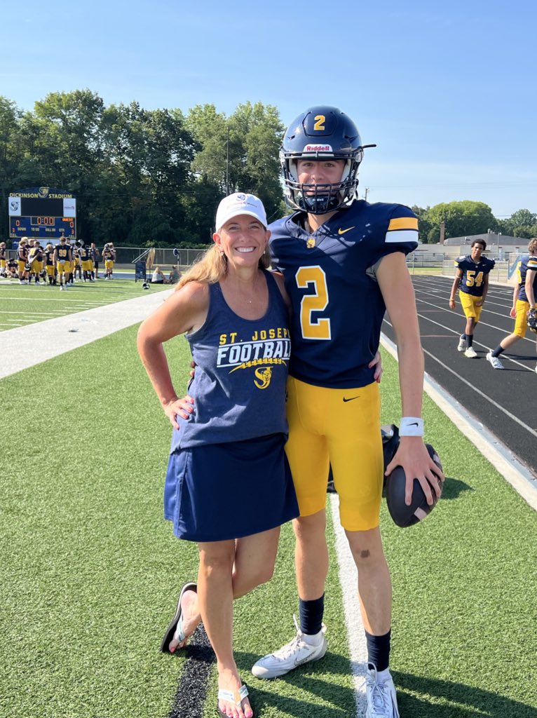 HudsonCorning's tweet photo. Maize &amp; Blue scrimmage - debut of the #2. Grateful to be able to get a pic with mom. 💙💛@stjoefootball https://t.co/rlbMQc7ZQC