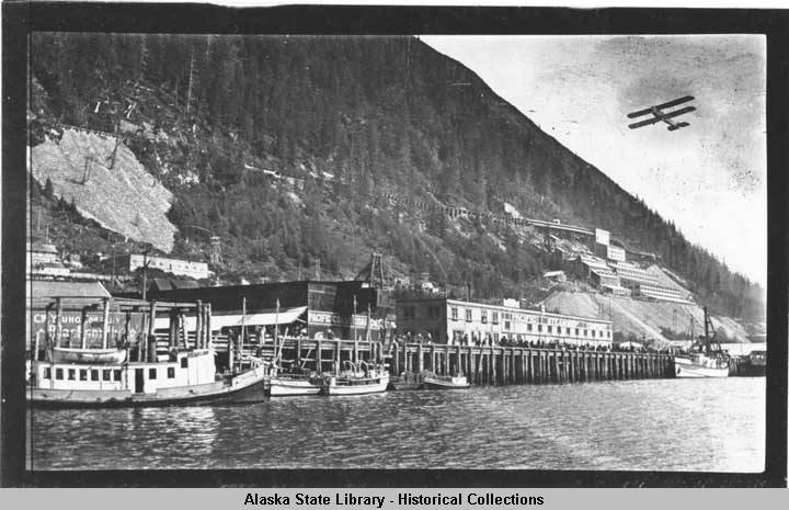 ANC_Historian's tweet photo. Aug 16, 1920, 1st airplane flight in Juneau. Lt. Ross Kirkpatrick flew a DH-4B over town &amp; dropped a New York Times for Gov Thomas Riggs. The visit was part of Black Wolf Squadron's round-trip New York-to-Nome Alaskan Flying Expedition. 105 years ago today. #alaskahistory #alaska https://t.co/dGyqctrQau