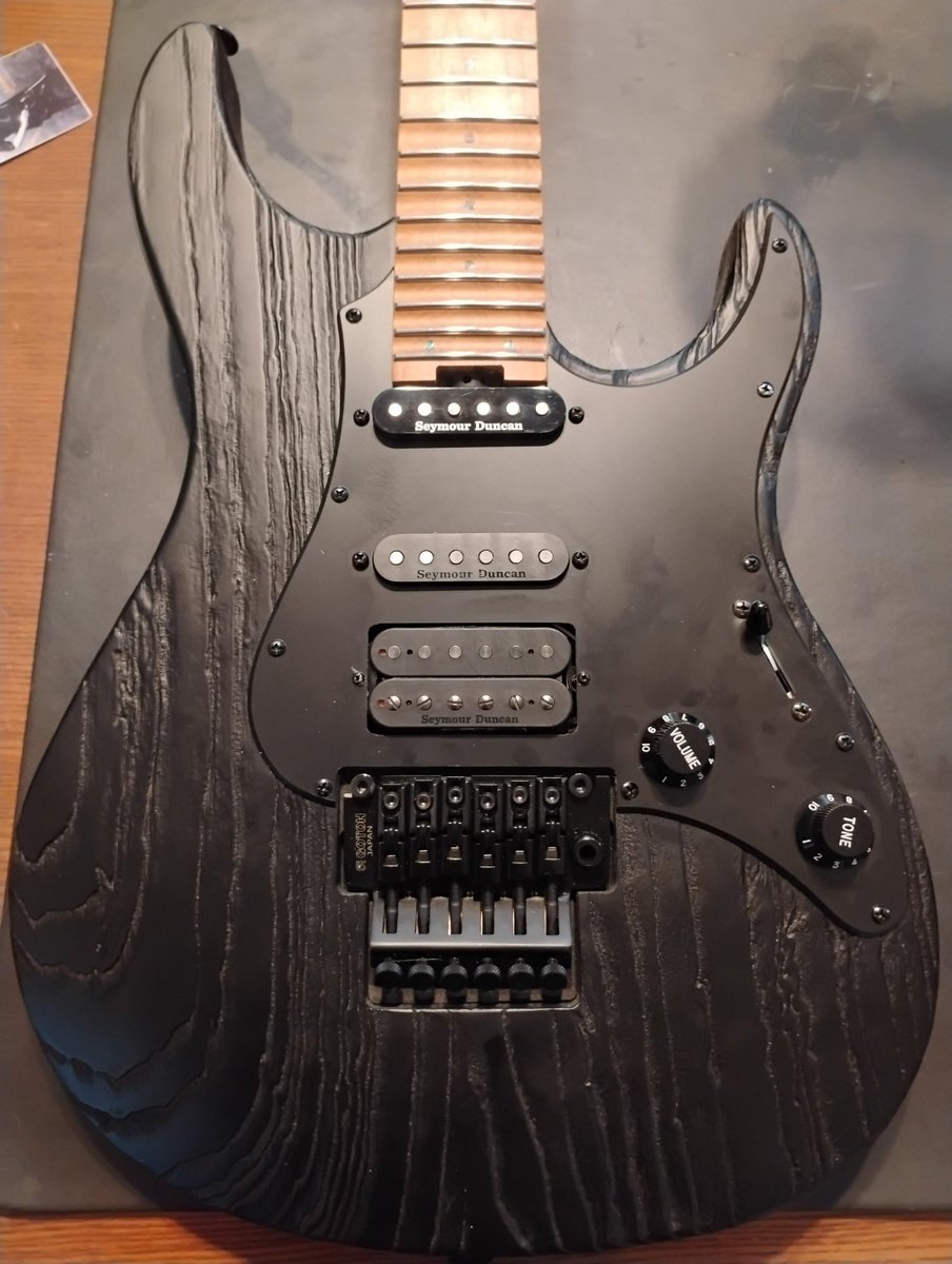 Review from a client after I upgraded electronics. "You did great. Pretty complex with a full size humbucker, a coil tap, a single coil and a single sized stacked humbuckers with a 5 way switch. Its basically dusting the philosophers stone of guitar electronics."