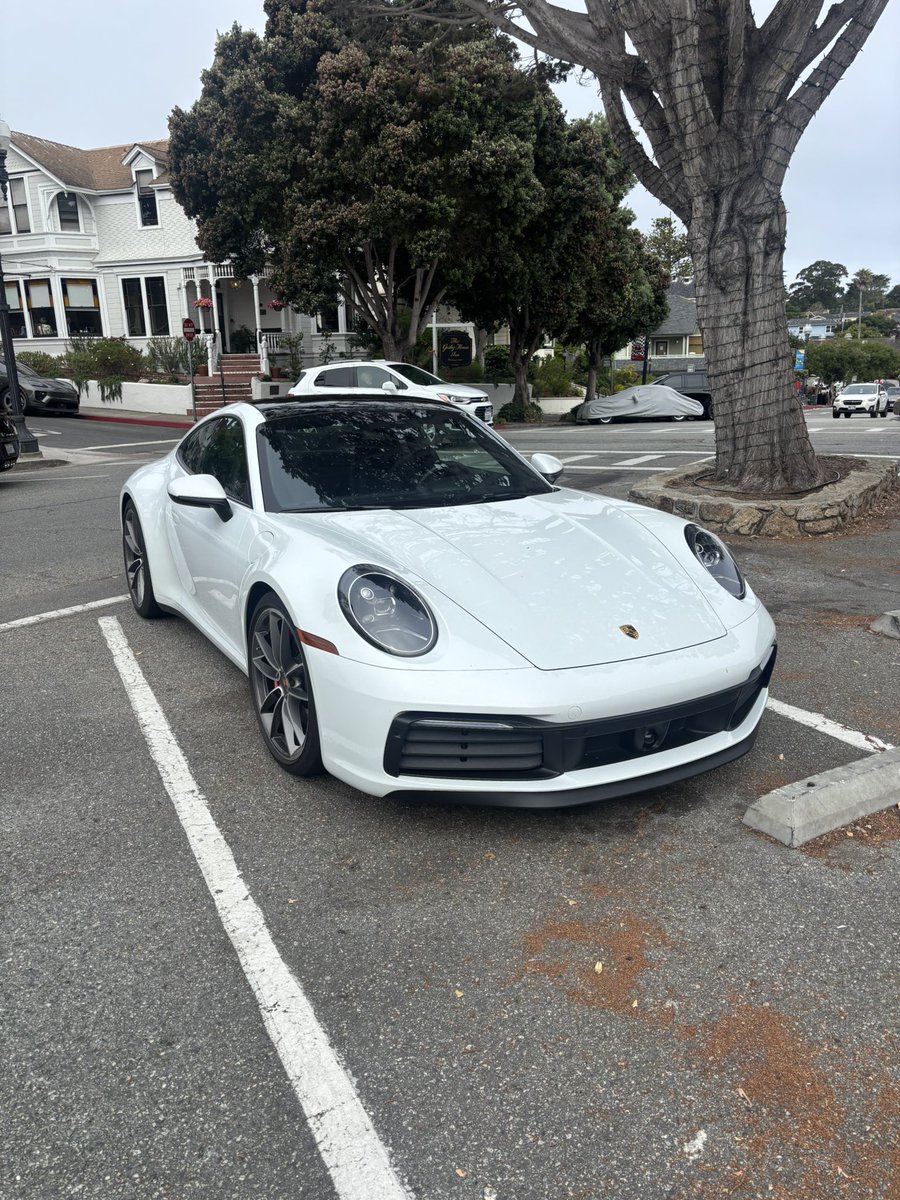 SoftwareEng912's tweet photo. Quite a few mid cars parked outside the residence. #carweek https://t.co/IJIwPM4qAQ