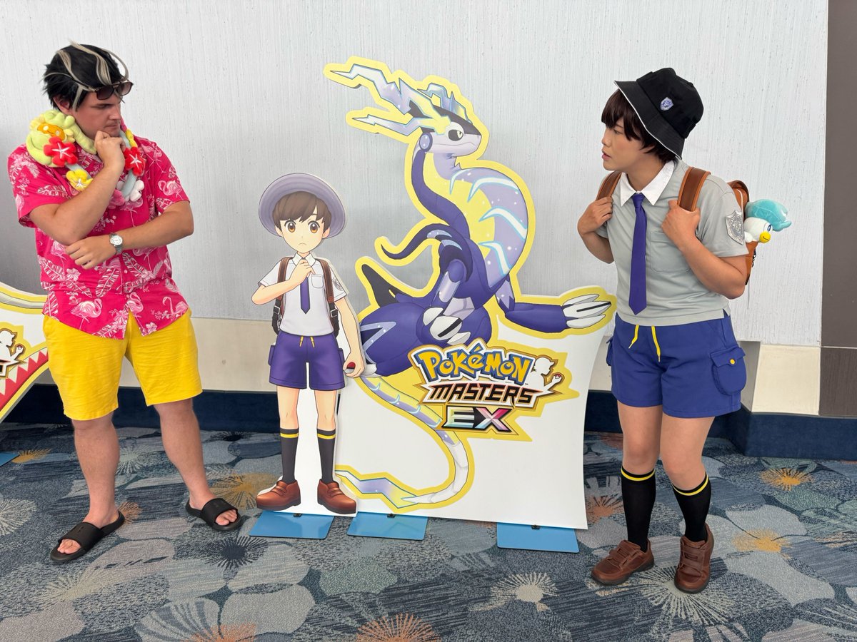 PokemonMasters's tweet photo. On a brief vacation from Pasio, we visited California, and it looks like Trainers are having a BLAST at #PokemonWorlds!

We even synced up with a few fabulous cosplayers!

Alymisu as Carmine
IDSpuds as Florian
AmperSanders as Larry
Palmtop_Kitty as Irida https://t.co/QqakrgKVJD