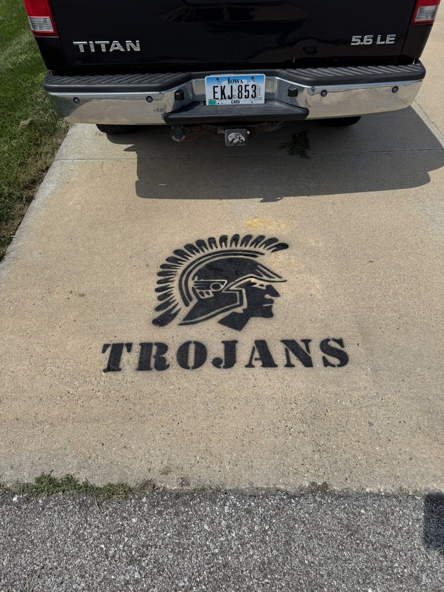 Thanks to Senior Football Players for applying Trojan Driveway Decal this morning!!

Go Trojans!!!