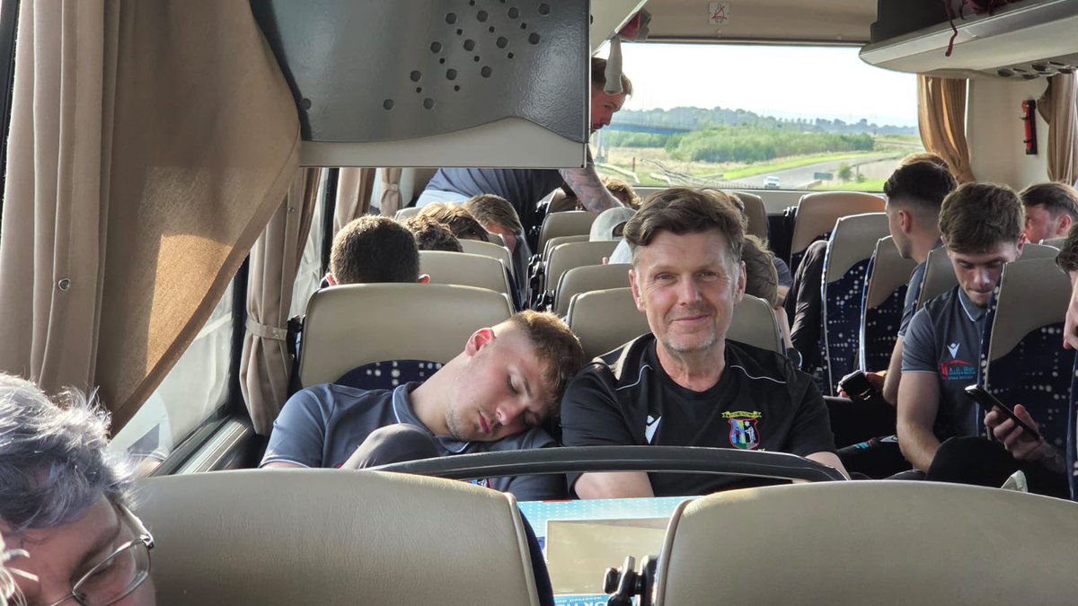 TranentFC's tweet photo. Goalkeeper, Sam Scott caught slacking on the journey home… 📸

Our goalkeeper coach, Colin clearly isn’t just the club keeper coach… but also the club pillow! 🤣

Sorry not sorry, Sam…

#TheBelters 🇱🇻 #LieForrit https://t.co/x3RdC7gdJ8