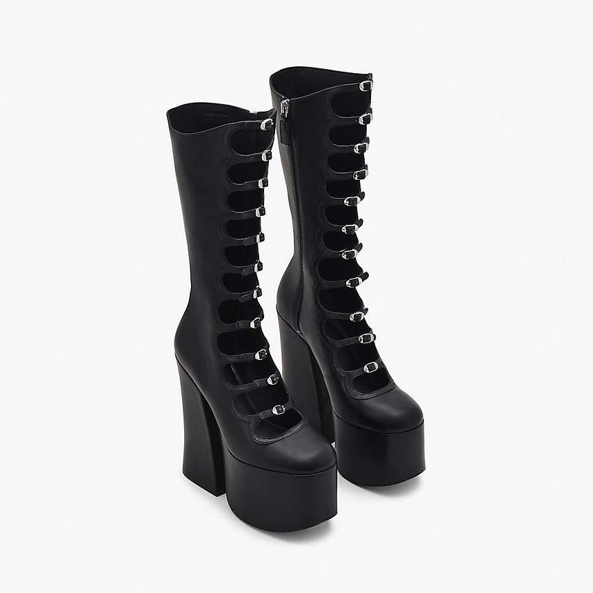 Yseult wearing Marc Jacob’s The Kiki Knee-High Boot for the MENTAL TOUR poster.