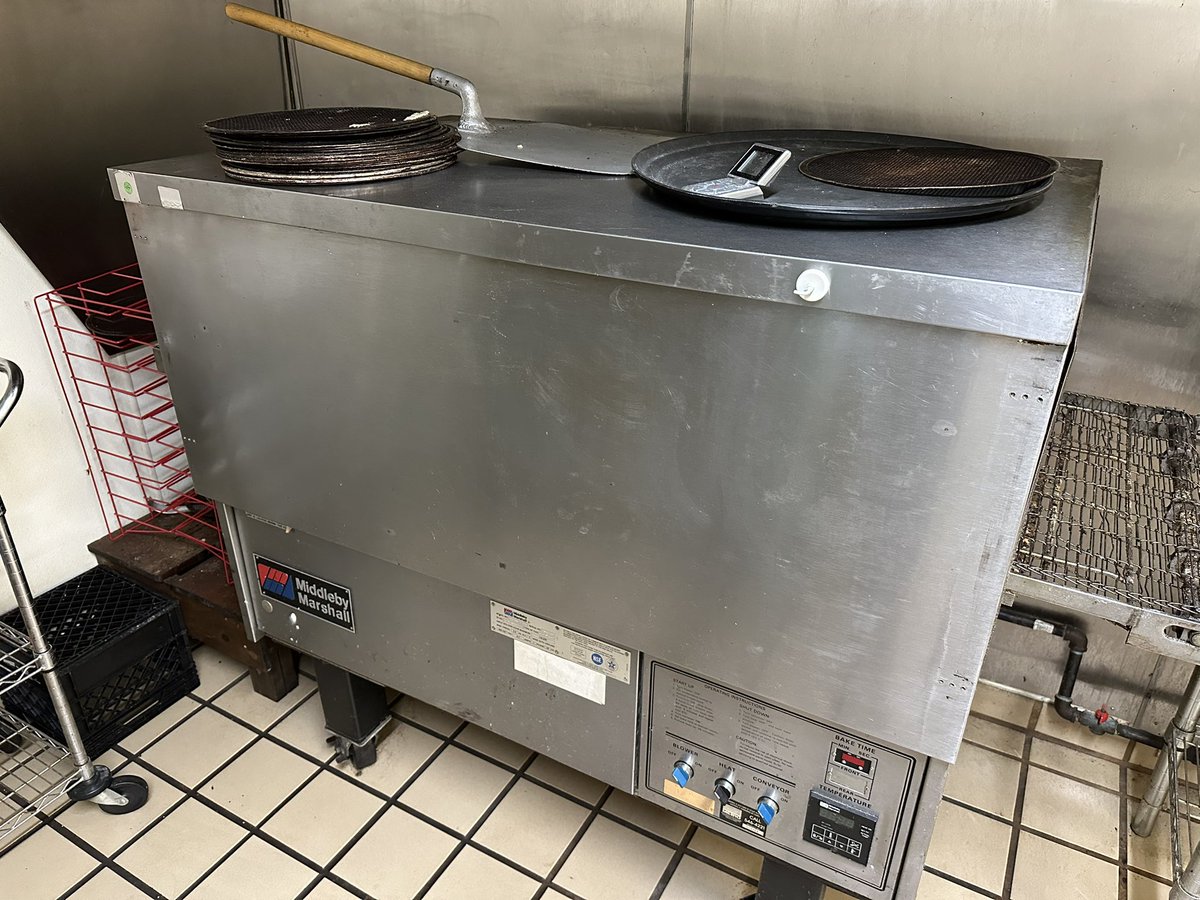 Restaurant-To-Home Update:
The pizza oven has left the building.

Had to remove part of the doorframe to get it out, but it’s moved on to an Italian pizzeria in Detroit. I think it’ll be happy there.

And we’re happy about gaining the extra space for our guest bedroom.