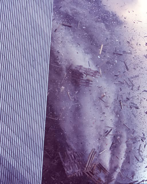 At 10:28:24 a.m. on September 11, photojournalist Bill Biggart captured the last photograph of his life. 

He inhaled his final breath shortly thereafter as the North Tower of the World Trade Center dust fell on him. 

Four days later, his body was discovered by searchers, along