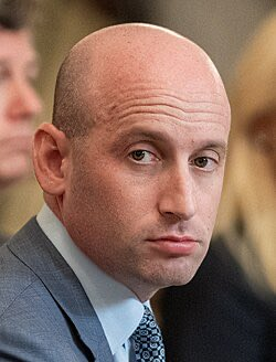 Is Stephen Miller a criminal, a racist, or both?