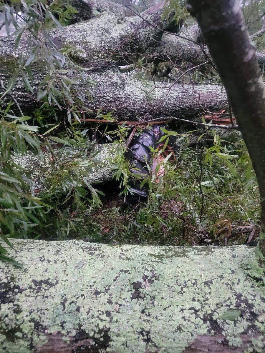 MathewB27823762's tweet photo. Well, I have a tossed salad in my front yard with a side of mitsubishi and Ford tractor. But my family and house are ok. https://t.co/cuUSypdCCY