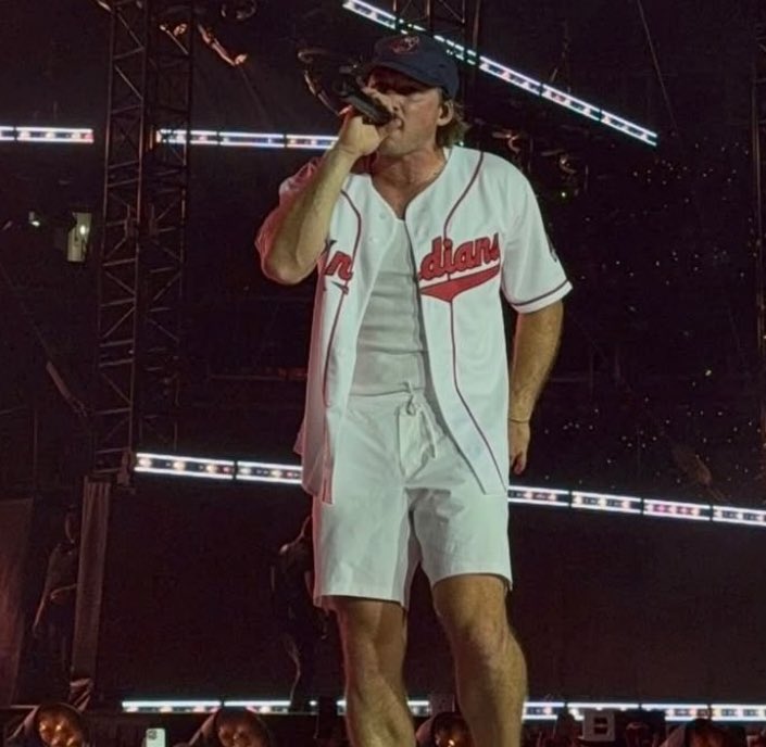 OhioTate's tweet photo. Morgan Wallen aced his Cleveland concert outfits with a Jim Thome jersey, Jim Brown uniform, and a LeBron James St Vincent St Mary jersey https://t.co/YoOxODncLG